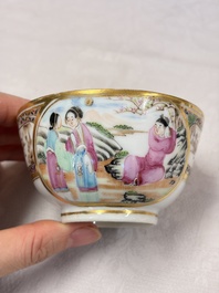 A pair of Chinese Canton famille rose cups and saucers with figural design, Daoguang