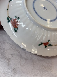 Four Chinese famille verte cups and seven saucers, 19th C.