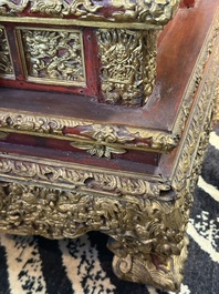 An exceptional Vietnamese gilt-lacquered wood and ivory 'Dragon and Phoenix' throne-shaped altar, 18/19th C.