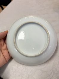 A pair of Chinese Canton famille rose cups and saucers with figural design, Daoguang