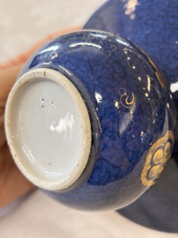 A Chinese powder-blue-ground gilt-decorated spittoon and two gilt-bronze-mounted vases, 18th C.