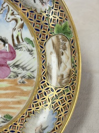A pair of Chinese Canton famille rose cups and saucers with figural design, Daoguang