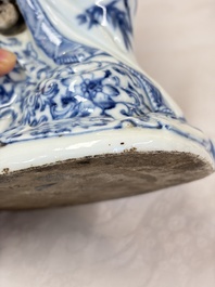 A Chinese blue and white 'Guanyin and child' group, Qianlong