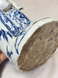 A Chinese blue and white 'Guanyin and child' group, Qianlong