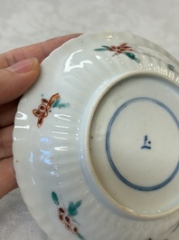 Four Chinese famille verte cups and seven saucers, 19th C.