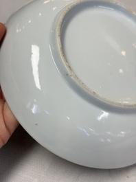 A pair of Chinese Canton famille rose cups and saucers with figural design, Daoguang