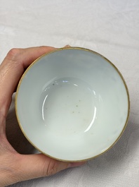 A pair of Chinese Canton famille rose cups and saucers with figural design, Daoguang