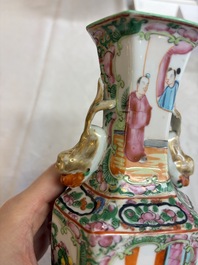 A pair of Chinese Canton famille rose hat stands, a covered vase, a vase and a bowl, 19th C.