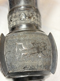 A pair of Chinese archaistic bronze 'Gu' vases, 18th C.