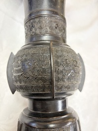 A pair of Chinese archaistic bronze 'Gu' vases, 18th C.