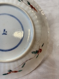 Four Chinese famille verte cups and seven saucers, 19th C.