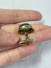 A pair of 18kt yellow gold cufflinks with green cabochon stones, 20th C.
