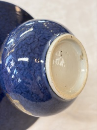 A Chinese powder-blue-ground gilt-decorated spittoon and two gilt-bronze-mounted vases, 18th C.