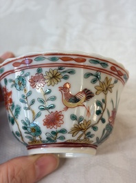 Four Chinese famille verte cups and seven saucers, 19th C.