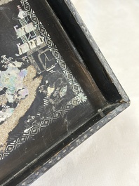 A rare large square Chinese laque burgaut&eacute; tray depicting a mountainous garden, Kangxi
