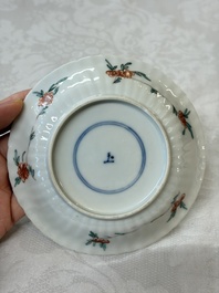 Four Chinese famille verte cups and seven saucers, 19th C.