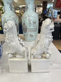 A pair of large Chinese Dehua blanc de Chine buddhist lion joss stick holders, 19th C.