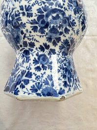 A pair of blue and white Dutch Delft garlic-head vases mounted as lamps, 18th C.