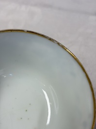 A pair of Chinese Canton famille rose cups and saucers with figural design, Daoguang