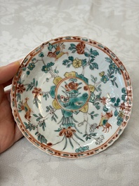 Four Chinese famille verte cups and seven saucers, 19th C.
