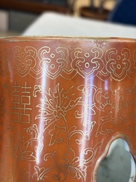 A Chinese famille rose spittoon, a famille verte covered double-gourd vase and a gilt-decorated coral-red-ground hat stand, Daoguang mark, 19th C.