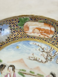 A pair of Chinese Canton famille rose cups and saucers with figural design, Daoguang