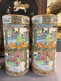 A pair of Chinese Canton famille rose hat stands, a covered vase, a vase and a bowl, 19th C.