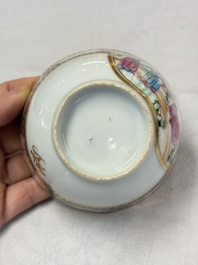 A pair of Chinese Canton famille rose cups and saucers with figural design, Daoguang