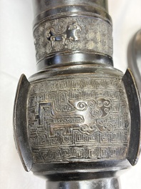 A pair of Chinese archaistic bronze 'Gu' vases, 18th C.