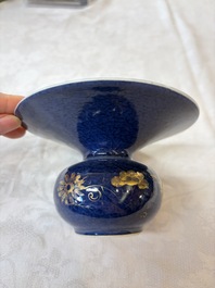 A Chinese powder-blue-ground gilt-decorated spittoon and two gilt-bronze-mounted vases, 18th C.