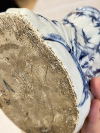 A Chinese blue and white 'Guanyin and child' group, Qianlong