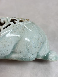 A pair of Chinese polychrome lions, a celadon-glazed goat, a yellow-glazed bowl and a sancai-glazed conical bowl, Chenghua mark, 19/20th C.