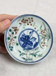 Three Chinese enamelled blue and white covered bowls on stands and a famille rose vase, Kangxi and Tongzhi mark, 19/20th C.