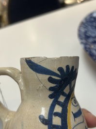 A very rare polychrome Antwerp maiolica 'IHS' jug, 16th C.