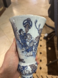 An extremely rare blue, white and manganese Dutch Delft chinoiserie beaker vase after a silver model, late 17th C.