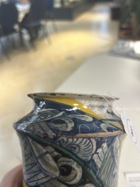 A polychrome Italian maiolica 'a trofei' albarello, inscribed V. APOSTL, Deruta, late 16th C.
