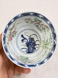 Three Chinese enamelled blue and white covered bowls on stands and a famille rose vase, Kangxi and Tongzhi mark, 19/20th C.
