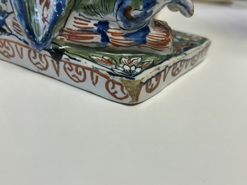 An important pair of polychrome Dutch Delft cashmere palette figures of Diana and Mercury, dated 172(?)