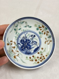 Three Chinese enamelled blue and white covered bowls on stands and a famille rose vase, Kangxi and Tongzhi mark, 19/20th C.