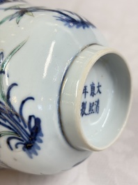 Three Chinese enamelled blue and white covered bowls on stands and a famille rose vase, Kangxi and Tongzhi mark, 19/20th C.