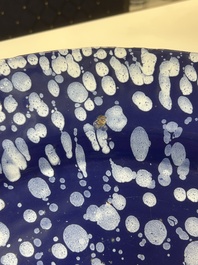 A rare large Nevers white-splashed blue-ground '&agrave; la bougie' dish, France, late 17th C.
