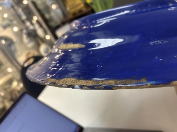 A rare large Nevers white-splashed blue-ground '&agrave; la bougie' dish, France, late 17th C.