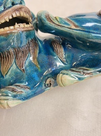 A pair of Chinese polychrome lions, a celadon-glazed goat, a yellow-glazed bowl and a sancai-glazed conical bowl, Chenghua mark, 19/20th C.