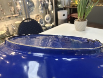 A rare large Nevers white-splashed blue-ground '&agrave; la bougie' dish, France, late 17th C.