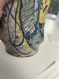 A polychrome Italian maiolica 'a trofei' albarello, inscribed V. APOSTL, Deruta, late 16th C.