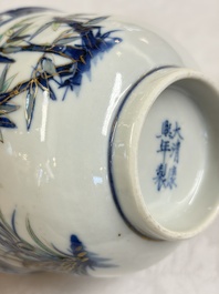Three Chinese enamelled blue and white covered bowls on stands and a famille rose vase, Kangxi and Tongzhi mark, 19/20th C.