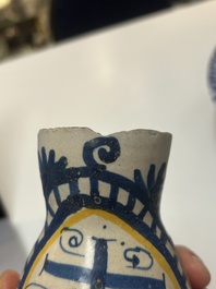 A very rare polychrome Antwerp maiolica 'IHS' jug, 16th C.