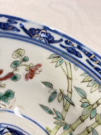 Three Chinese enamelled blue and white covered bowls on stands and a famille rose vase, Kangxi and Tongzhi mark, 19/20th C.