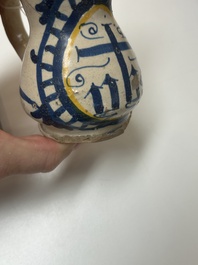 A very rare polychrome Antwerp maiolica 'IHS' jug, 16th C.