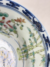 Three Chinese enamelled blue and white covered bowls on stands and a famille rose vase, Kangxi and Tongzhi mark, 19/20th C.